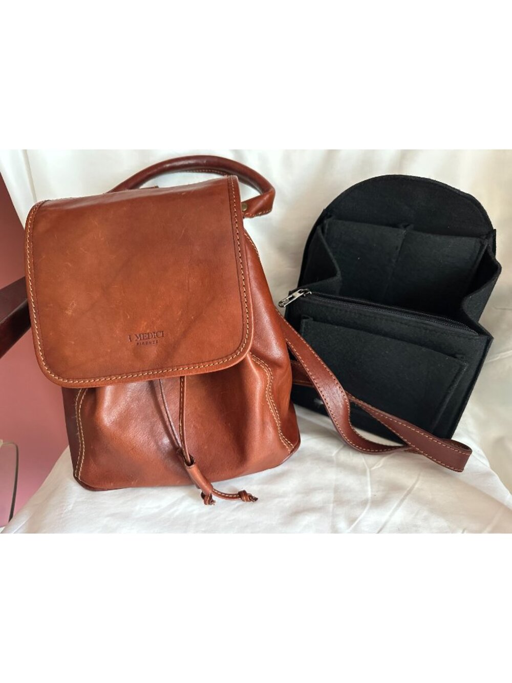 brown leather I Medici Firenze backpack with front flap drawstring closure made